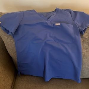 Size S winning blue Catarina one-pocket scrub top